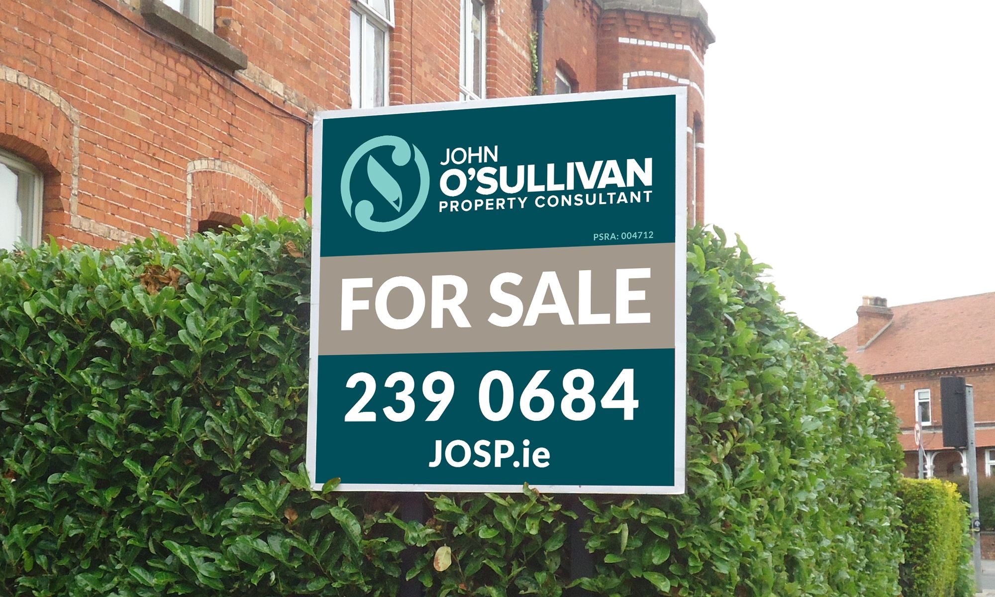 John O'Sullivan Property Consultant For Sale board outside a red-brick house