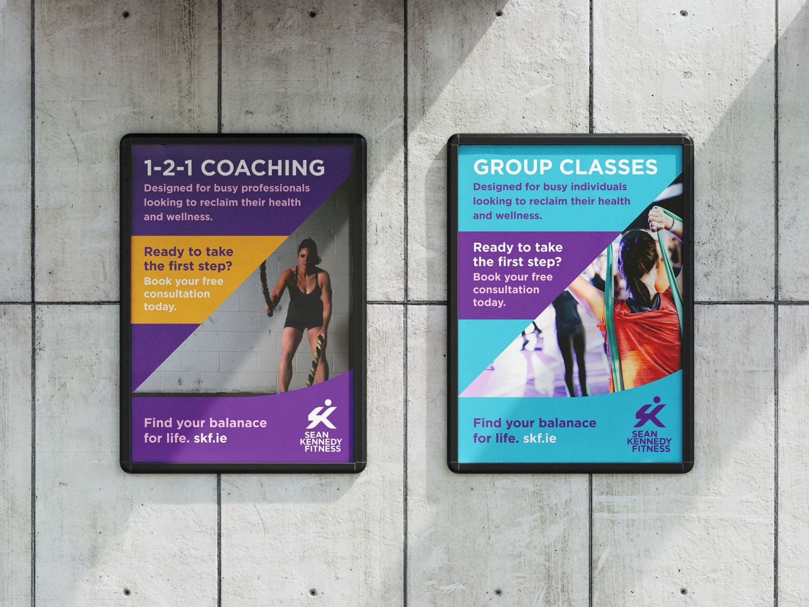 Two Sean Kennedy Fitness posters for one-to-one coaching and group classes on a concrete wall
